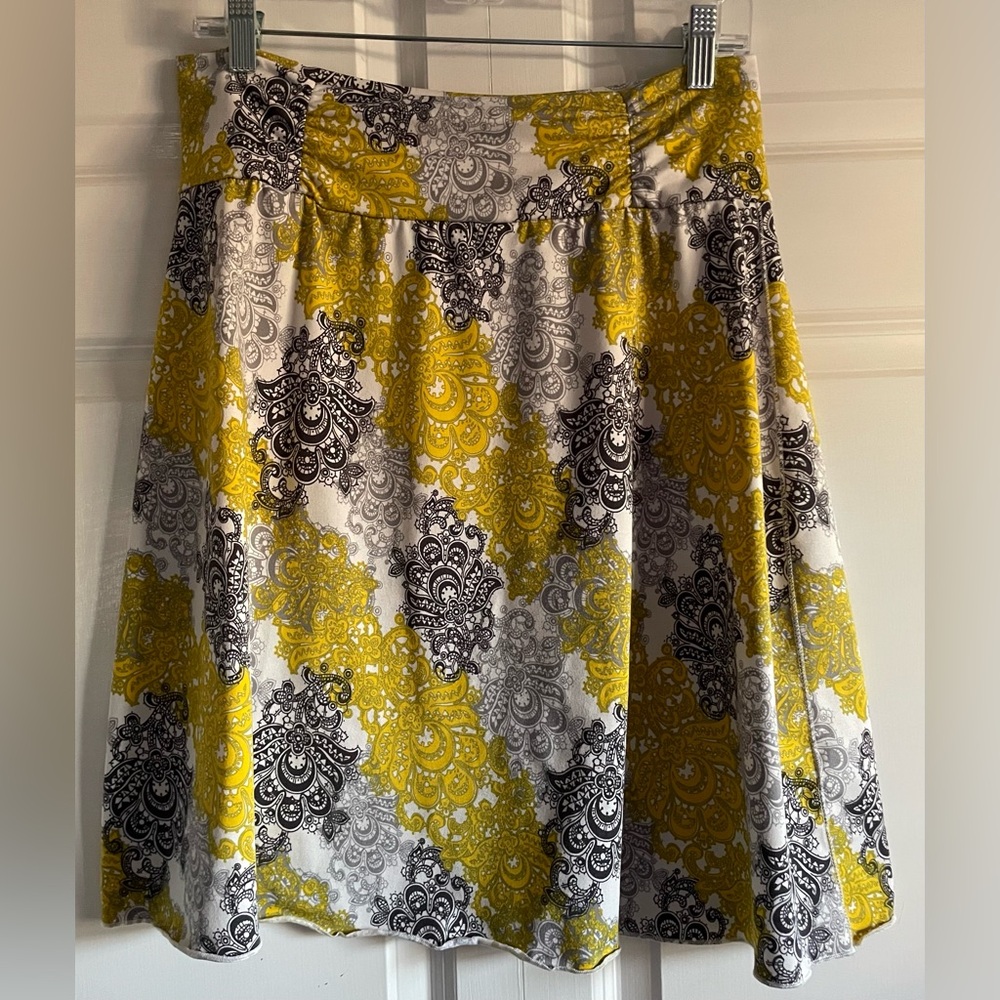 Knit skirt, yellow/black/grey paisley print, size small/medium.